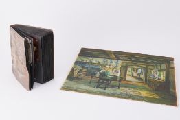 A vintage postcard album containing mixed cards including Edwardian and later period, together