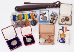 A collection of medals including a Great War trio awarded to W.H.B.Endacott and later Metropolitan