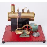 Mamod steam engine with boiler, 6" high, 8" square on Meccano platform.