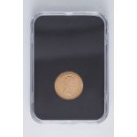 A 1957 QEII gold sovereign, first, laureate head of Elizabeth II facing right, boxed.