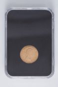 A 1957 QEII gold sovereign, first, laureate head of Elizabeth II facing right, boxed.