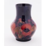 A William Moorcroft Pomegranate vase, height 13cm.