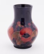 A William Moorcroft Pomegranate vase, height 13cm.