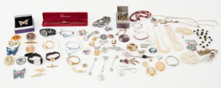 A large collection of costume jewellery including brooches, bracelets, faux pearls, necklaces,