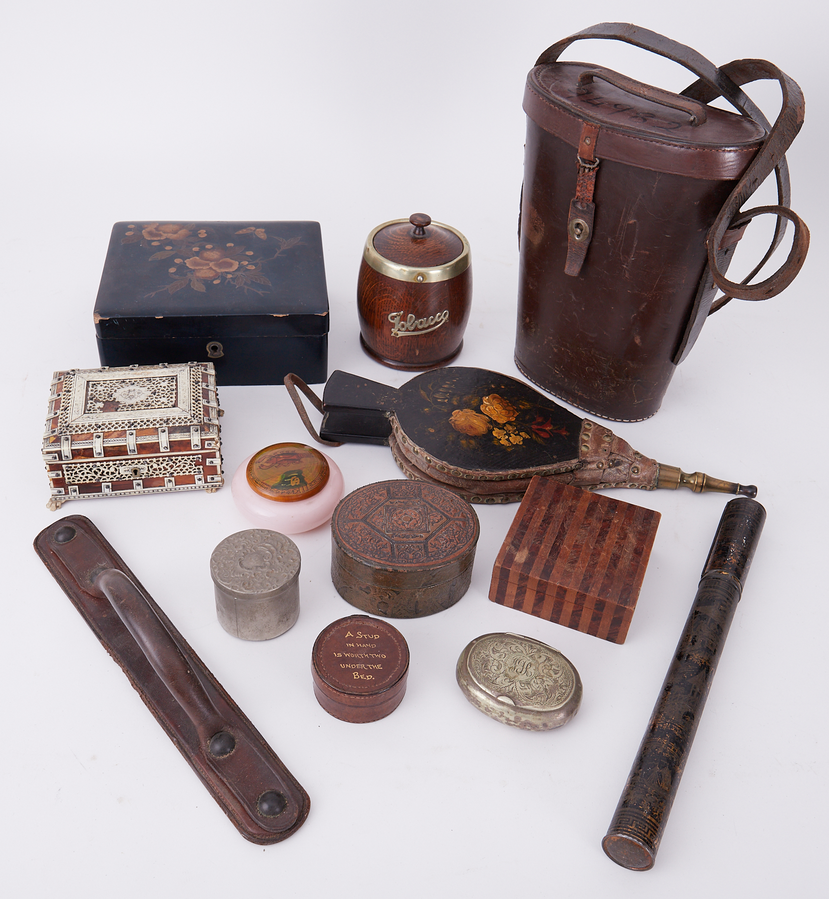 A mixed lot including old leather large binoculars case, Tortoiseshell style box, lacquered box, tea