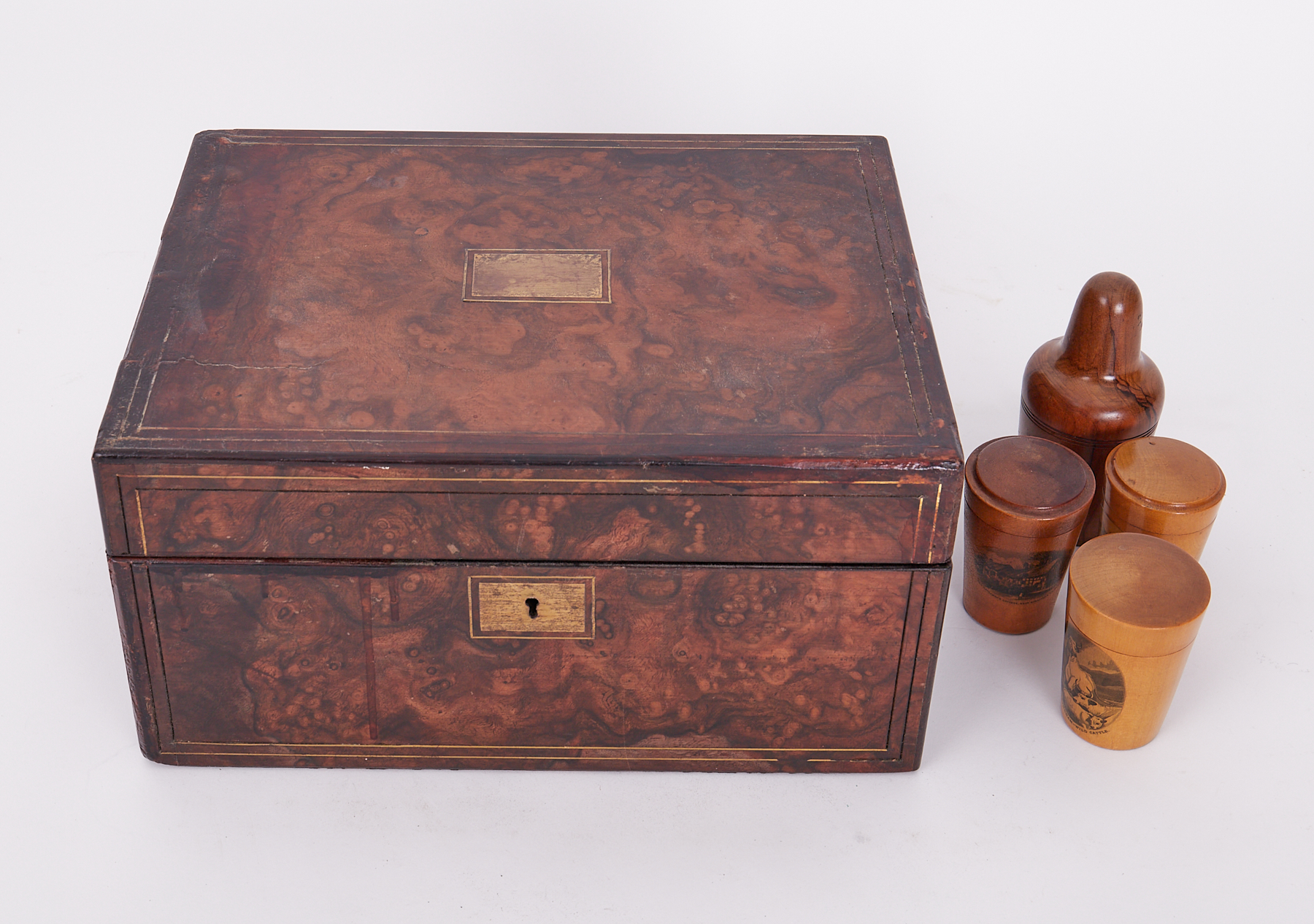 A Victorian walnut and brass strung sewing box fitted with interior containing various woodware,