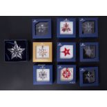 Swarovski Crystal Glass, ten boxed small Christmas 'Stars' hanging ornaments including 2009, 2007,