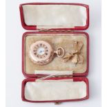 An ornate 14k cased pocket watch, stamped inside the backplate 83589 and on the inside plate stamped