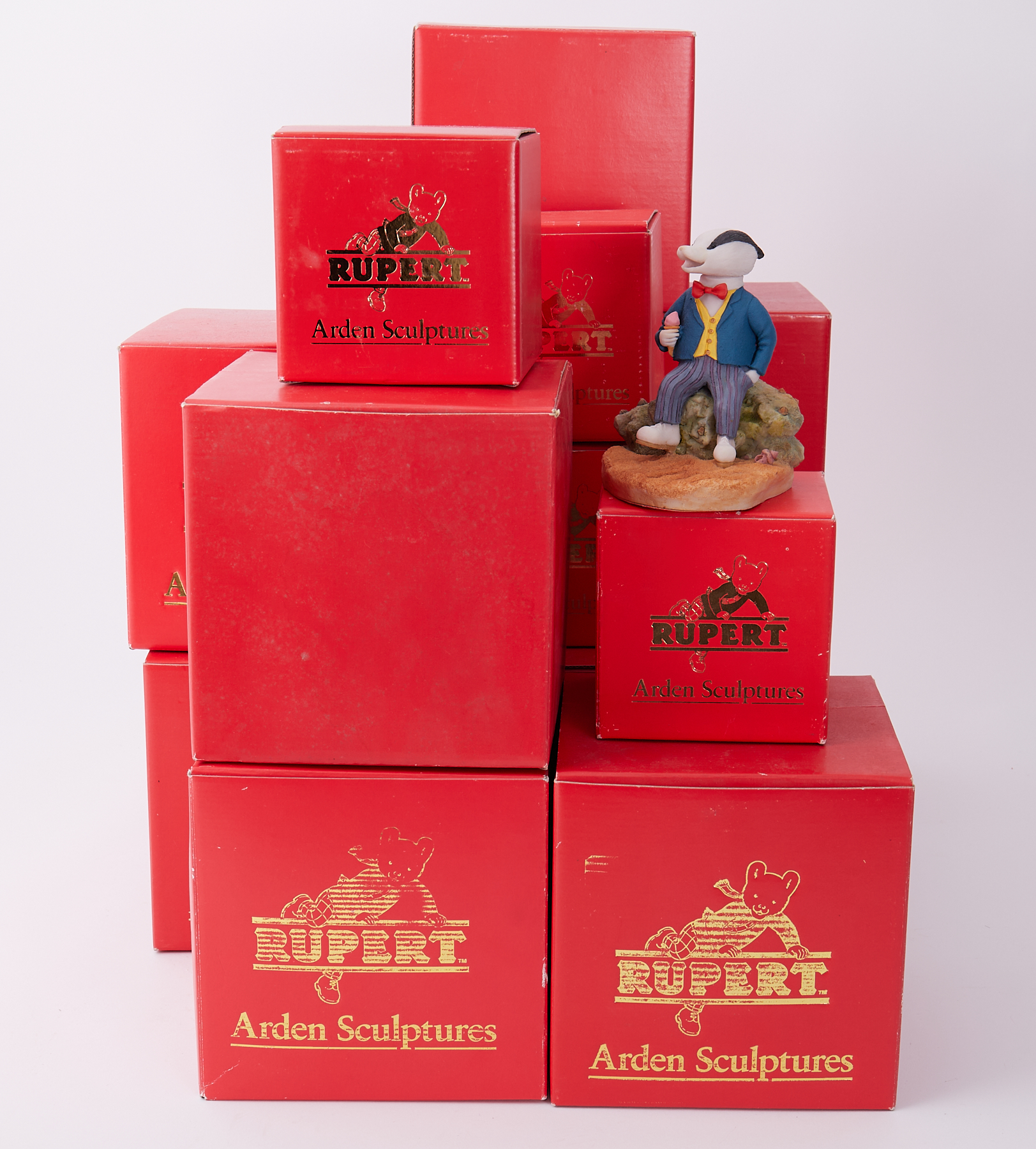 A collection of fifteen boxed Rupert's by Arden Sculptures.