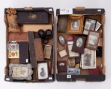 A mixed collection of objects including photo frames, treen, marbles, wood chess pieces and dominoes