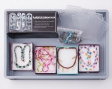 A large collection of 48 boxed sets of semi-precious & other bead jewellery to include amethyst,