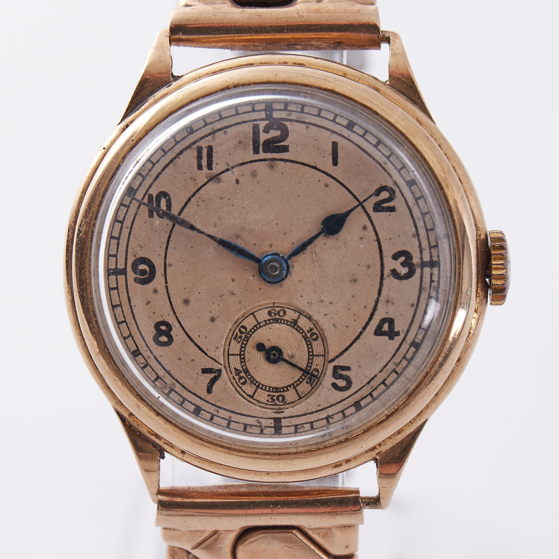A 9ct gold vintage wristwatch engraved on the back 'Presented to Col W T Woods by the Officials of