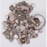 A mixed lot of silver jewellery to include ingot pendants, rings, bangles, chains, charm