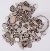 A mixed lot of silver jewellery to include ingot pendants, rings, bangles, chains, charm