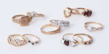 A mixed lot to include eleven 9ct gold rings, some gem set, total weight 22.46gm.