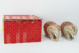 A pair of modern large Shiwan ware Elephants, height 26cm, with box.