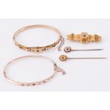 A mixed lot of Victorian jewellery to include two 9ct yellow gold bangles, one set with blue