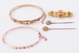 A mixed lot of Victorian jewellery to include two 9ct yellow gold bangles, one set with blue