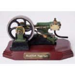 A Stuart Bassett Lowke 'Tangye' steam engine, 4" high.