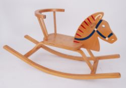 A small child's modern Rocking horse.