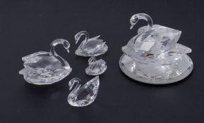 Swarovski Crystal Glass, a collection of Swans in various sizes, all boxed.