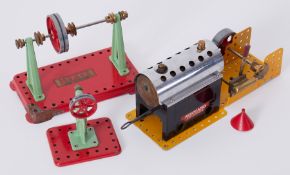 A Mamod line shaft and model power press together with a Meccano steam engine.