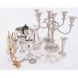 A small collection of silver plated wares including candelabra, napkin rings, sugar caster etc.