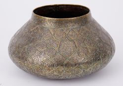 A middle eastern squat brass bowl, height 13cm.