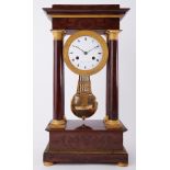 A French 19th century portico clock, marked on dial 'Gerard A Paris', height 55cm.