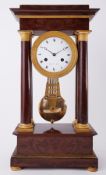 A French 19th century portico clock, marked on dial 'Gerard A Paris', height 55cm.