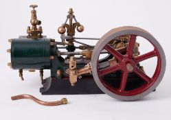 A Stuart No.9 horizontal steam engine complete with Governor, 6" high and 11" long.
