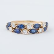 An 18ct yellow gold double row ring set with marquise cut sapphires, approx. total sapphire weight