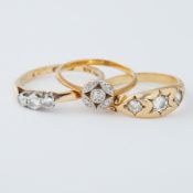 Three 18ct yellow gold rings to include an 18ct gold Art Deco circular style ring set small