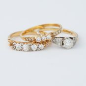 Three 18ct yellow gold rings to include an 18ct yellow gold & platinum single stone ring, 2.8gm,