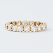 An 18ct yellow gold full eternity ring set with round brilliant cut diamonds, total diamond weight