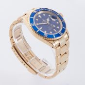 Rolex, an 18ct yellow gold Rolex Oyster Perpetual Date Submariner Chronometer, automatic, blue
