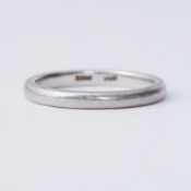 A platinum d-shaped wedding band, 5.43gm, size P.