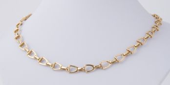 An 18ct yellow gold 'stirrup' design necklace by Equestrian Jewellery designer Rosemary