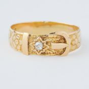 An antique 18ct yellow gold ornate buckle design ring set with a small old rose cut diamond, 4.