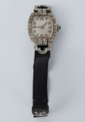 A platinum & diamond Art Deco ladies wristwatch with black fabric strap, 14.7gm.