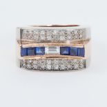 An impressive rose & white gold Art Deco style cocktail ring set with a line of baguette &