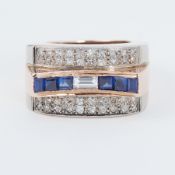 An impressive rose & white gold Art Deco style cocktail ring set with a line of baguette &