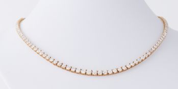 An impressive 18ct yellow gold necklace set with 12.78 carats of graduated round brilliant cut