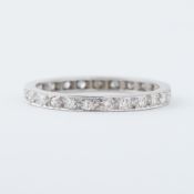 A white metal full eternity ring (not hallmarked or tested), set with round single cut diamonds,