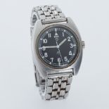 MWC, a Military MWC wristwatch with black dial and illuminated hands and markers, 34mm, stamped on