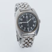 MWC, a Military MWC wristwatch with black dial and illuminated hands and markers, 34mm, stamped on