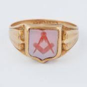 An 18ct yellow gold carved stone Masonic ring, 5.4gm, size S 1/2.