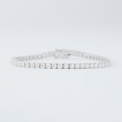 An 18ct white gold line bracelet set with approx. 5.10 carats of round brilliant cut diamonds,