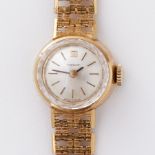 Tissot, an 18ct yellow gold vintage Tissot wristwatch with 18ct yellow gold bracelet, 26.79gm.