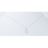 A platinum circular design pendant set with 0.50 carats of round brilliant cut diamonds on a 18"